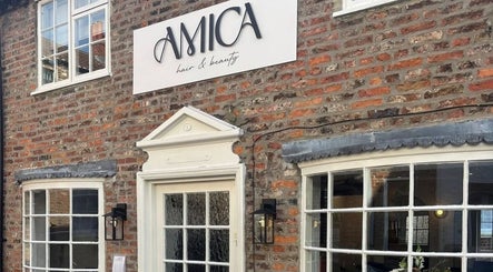 Exterior view of Hair By B at Amica Hair & Beauty, Thirsk, England, GB, showcasing its welcoming entrance.