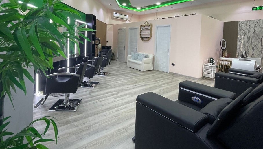 Modern interior of Eraya Beauty Salon in Dubai, AE featuring stylish styling chairs and elegant decor.