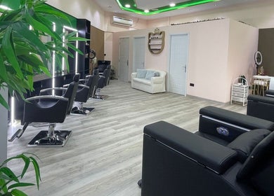 Modern interior of Eraya Beauty Salon in Dubai, AE featuring stylish styling chairs and elegant decor.