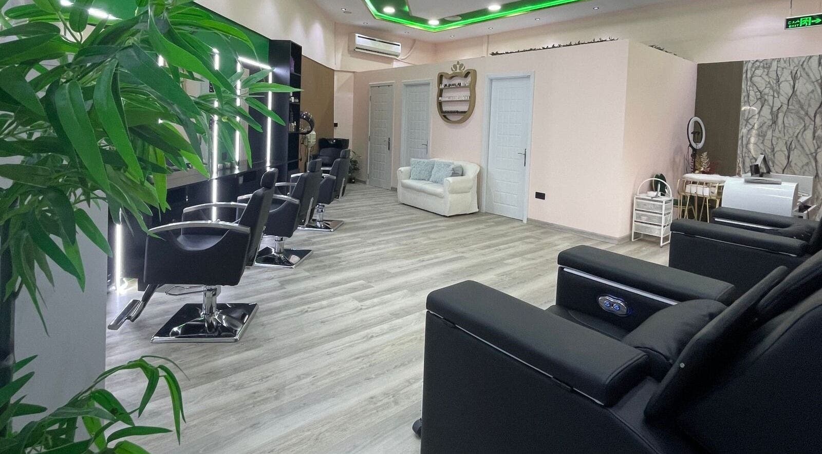 Modern interior of Eraya Beauty Salon in Dubai, AE featuring stylish styling chairs and elegant decor.