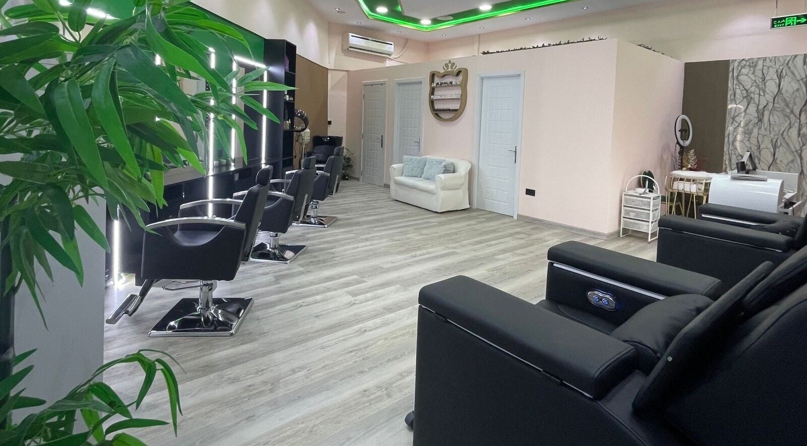 Modern interior of Eraya Beauty Salon in Dubai, AE featuring stylish styling chairs and elegant decor.