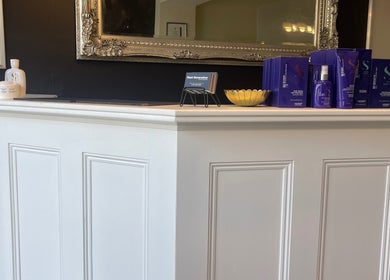 Hilary Shaw Hairdressing reception showcasing premium products in Banbridge, Northern Ireland, GB.