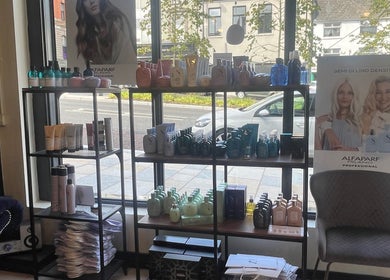 Product shelves at Hilary Shaw Hairdressing in Banbridge, Northern Ireland, GB showcasing haircare products.