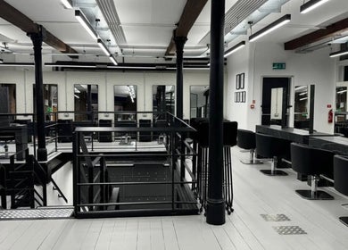 Chic interior of Hairbykatieanna salon in Manchester, England, GB showcasing sleek, modern design.