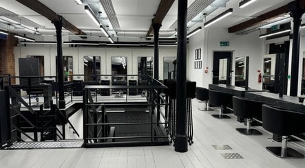 Chic interior of Hairbykatieanna salon in Manchester, England, GB showcasing sleek, modern design.