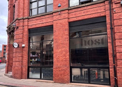 Exterior of Hairbykatieanna at a chic red brick building in Manchester, England, GB