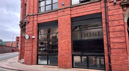 Exterior of Hairbykatieanna at a chic red brick building in Manchester, England, GB