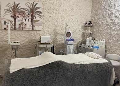 Treatment room at BRIO Med Spa in Flowery Branch, Georgia, US, showcasing a tranquil ambiance with spa equipment.