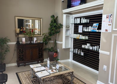 Sophisticated reception area at BRIO Med Spa in Flowery Branch, Georgia, US, showcasing luxurious decor and products.