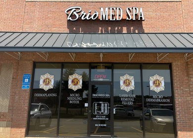 Entrance of BRIO Med Spa in Flowery Branch, Georgia, US showcasing services and accessible parking.