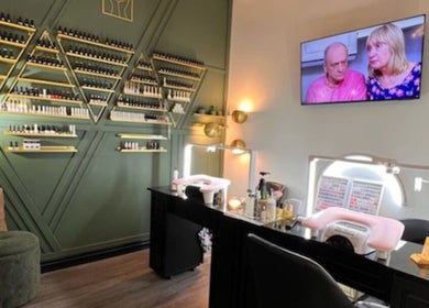 Chic nail salon interior at Shine Nails in Buffalo Grove, Illinois, US, showcasing elegant polish displays.