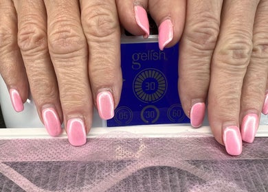 Elegant pink manicured nails at Shine Nails in Buffalo Grove, Illinois, US.
