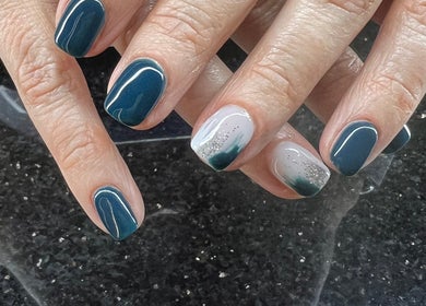 Stylish navy and silver gradient nails at Shine Nails, Buffalo Grove, Illinois, US.