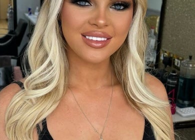 Smiling woman with elegant makeup at Chloe Newbold - makeup beauty, Liverpool, England, GB.