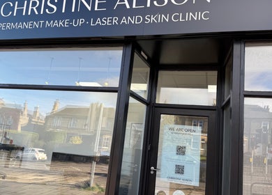 Entrance of Simone Services beauty clinic in Edinburgh, Scotland, GB showcasing modern facade.