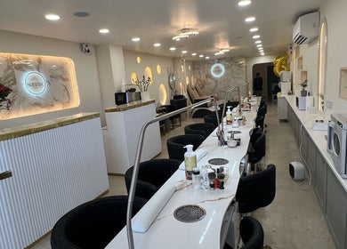 Chic interior of Sunrise Hand & Foot Spa, Bray, County Wicklow, IE, displaying a modern manicure station.