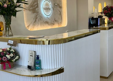 Reception area at Sunrise Hand & Foot Spa in Bray, County Wicklow, IE with elegant floral decorations.