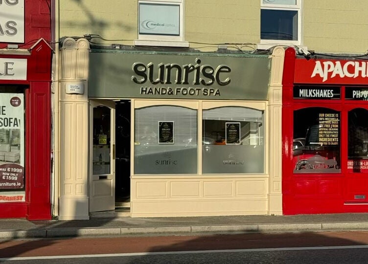 Front view of Sunrise Hand & Foot Spa at Bray, County Wicklow, IE showcasing elegant signage.