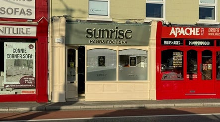 Front view of Sunrise Hand & Foot Spa at Bray, County Wicklow, IE showcasing elegant signage.