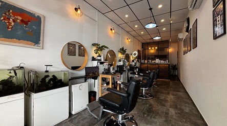 Stylish interior of SIXTH BARBERSHOP in Shah Alam, Selangor, MY with modern barber chairs and decor.