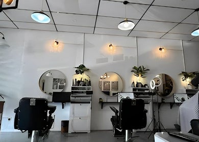 Interior of SIXTH BARBERSHOP in Shah Alam, Selangor, MY, featuring modern styling stations and chic decor.