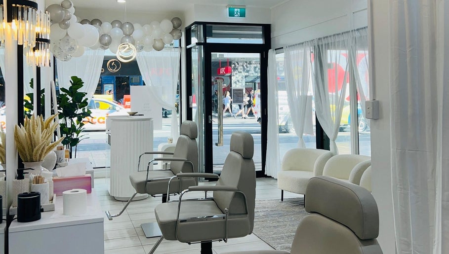 Chic interior of Browline & Lashes, Bondi Junction with stylish chairs and decor.