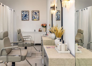 Chic interior of Browline & Lashes-Spring Street, Bondi Junction, New South Wales, AU with styling chairs and decor.