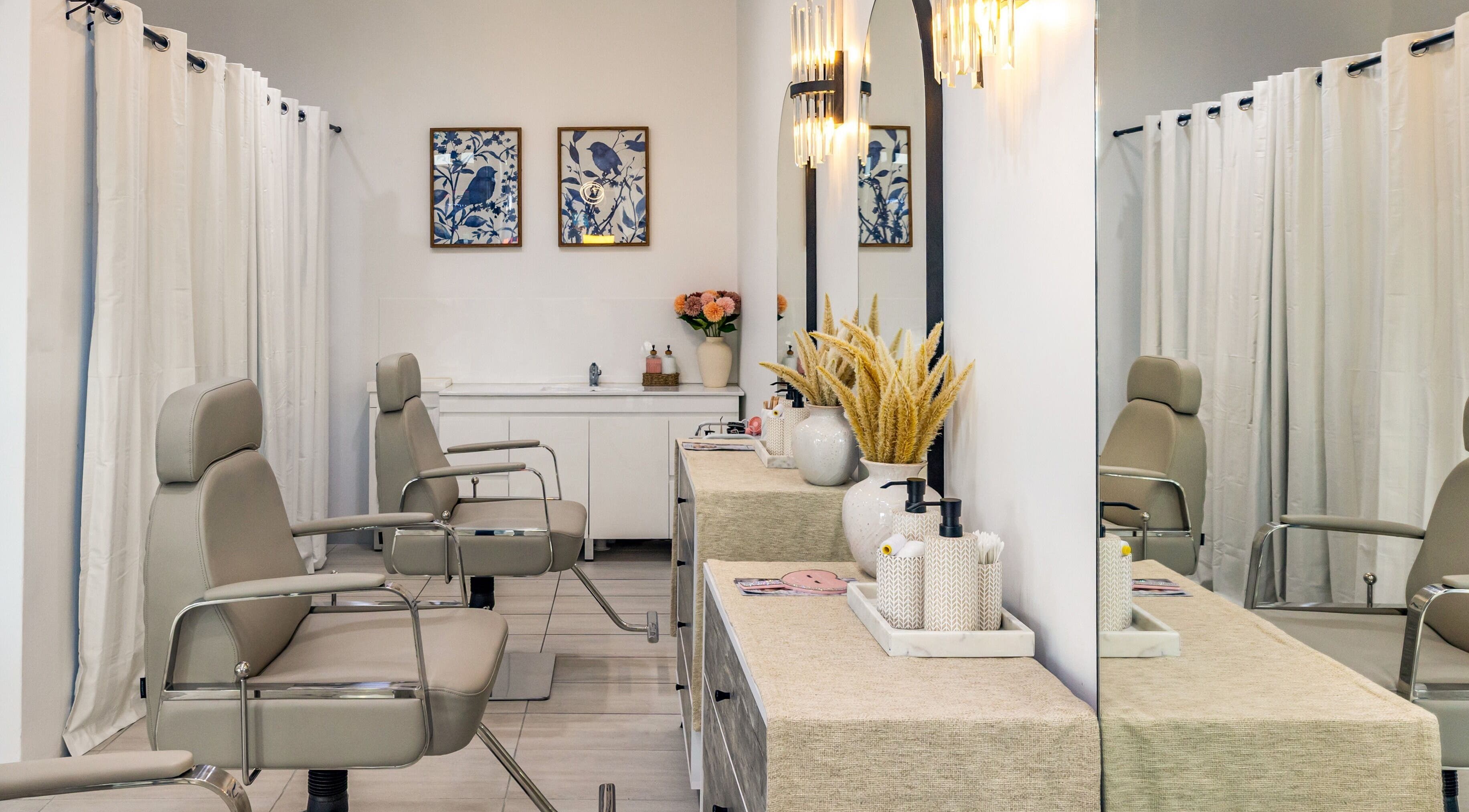 Chic interior of Browline & Lashes-Spring Street, Bondi Junction, New South Wales, AU with styling chairs and decor.