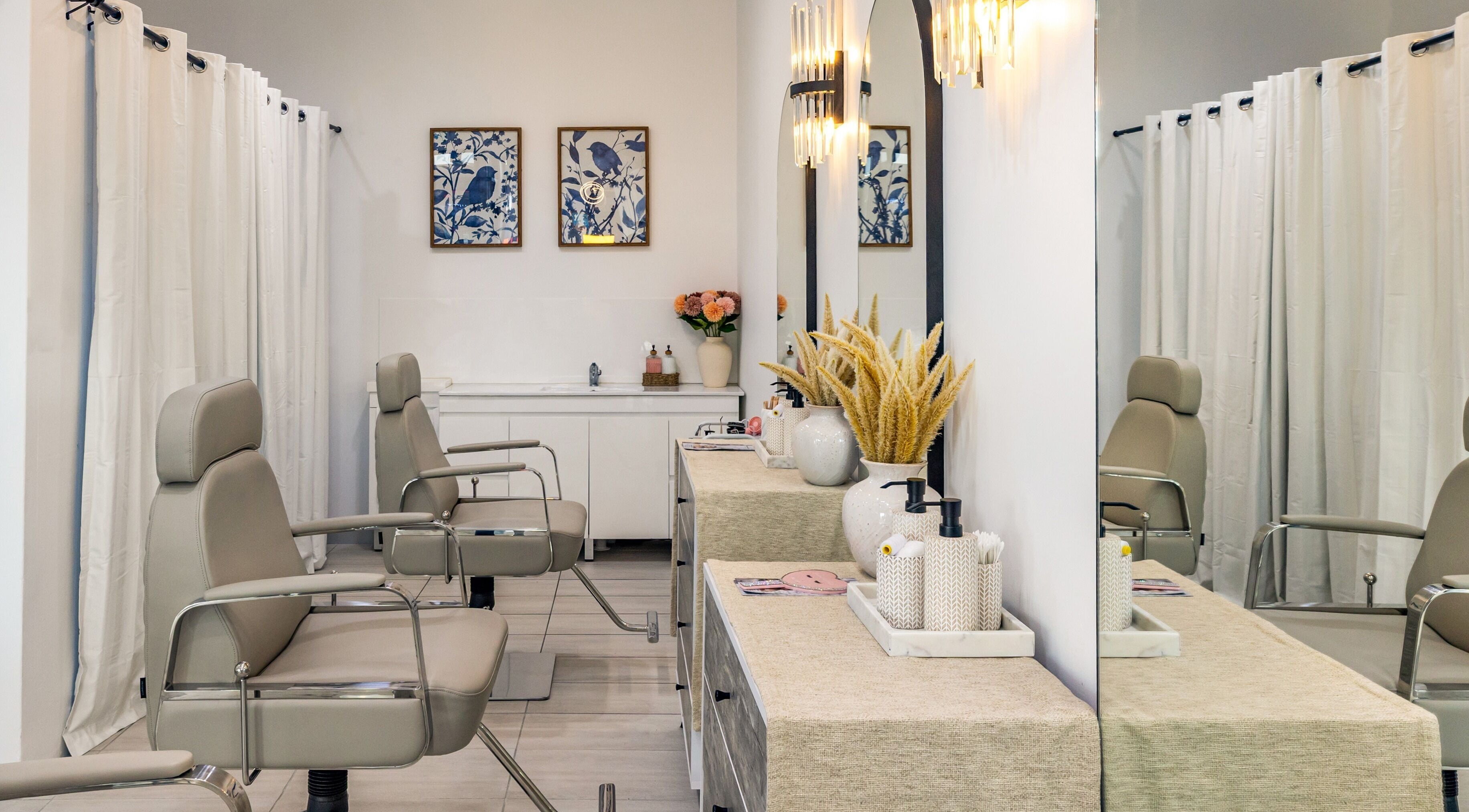 Chic interior of Browline & Lashes-Spring Street, Bondi Junction, New South Wales, AU with styling chairs and decor.