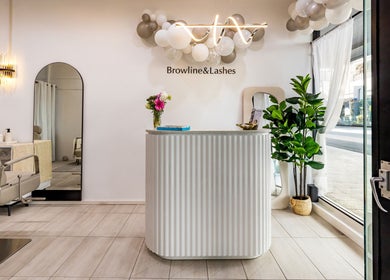 Reception area at Browline & Lashes-Spring street in Bondi Junction, New South Wales, AU, elegantly decorated.