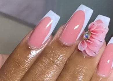 Elegant pink nails with floral art at Clawed By Grace, Freeport, Freeport, BS. Perfect for stylish looks.