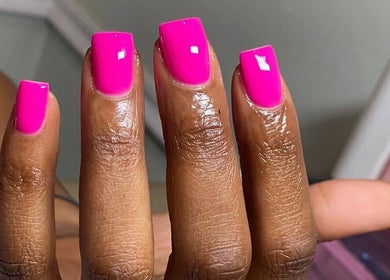 Bright pink manicured nails at Clawed By Grace, Freeport, Freeport, BS.