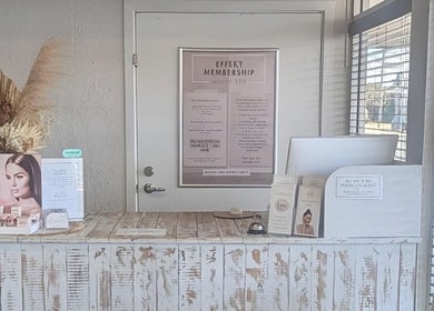 Effekt Skin Clinic reception desk in Berserker, Queensland, AU showcasing elegant display and marketing materials.