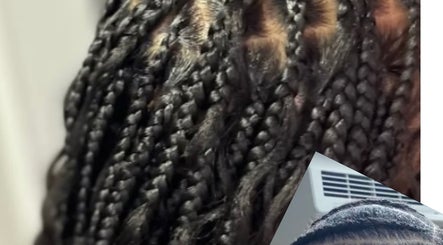 Intricate braids showcase beauty at Glow&Go in Florida, Florida, US.