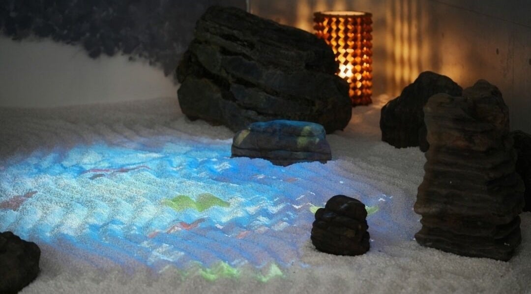 Serene zen garden ambiance at Othello, Kuala Lumpur, Wilayah Persekutuan Kuala Lumpur, MY with calming stone arrangement.