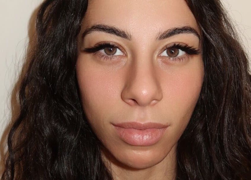 Close-up of a woman's radiant face at Amazing Audrey, Parramatta, New South Wales, AU.