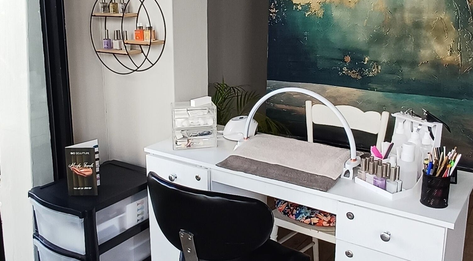Nail station at Nails by Shannon in Gqeberha, Eastern Cape, ZA, featuring elegant decor and manicure tools.