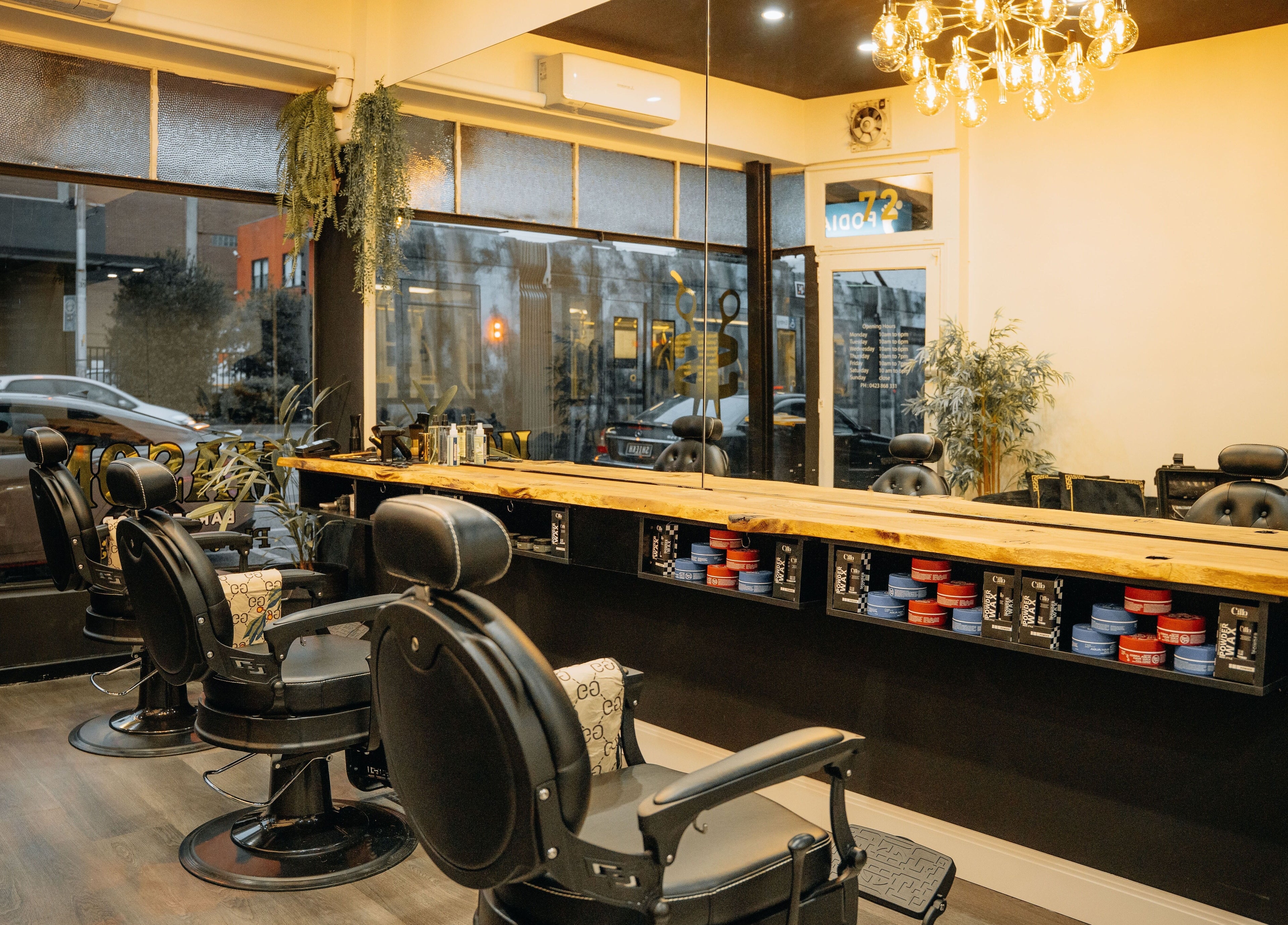 Elegant interior of Mason Barbershop in Melbourne, Victoria, AU, showcasing stylish barber chairs and decor.