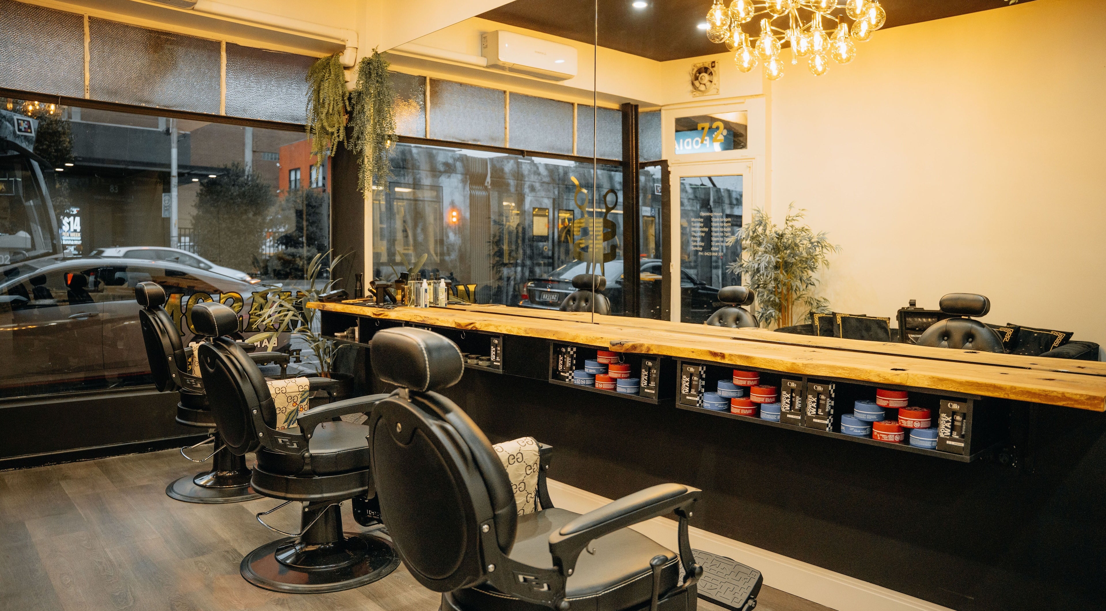 Elegant interior of Mason Barbershop in Melbourne, Victoria, AU, showcasing stylish barber chairs and decor.