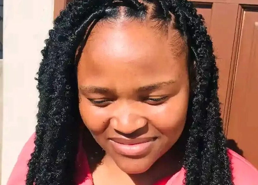 Braided hairstyle at Nomsa's beauty salon in Vanderbijlpark, Gauteng, ZA, showcasing intricate design.