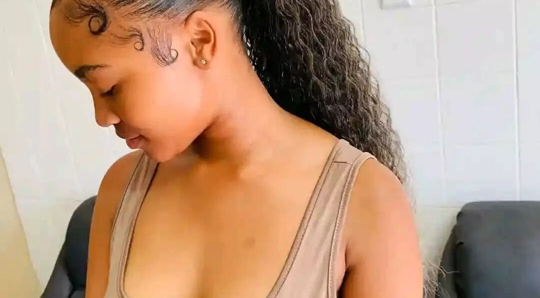 Elegant hairstyle showcase at Nomsa's beauty salon in Vanderbijlpark, Gauteng, ZA, highlighting sleek ponytail.