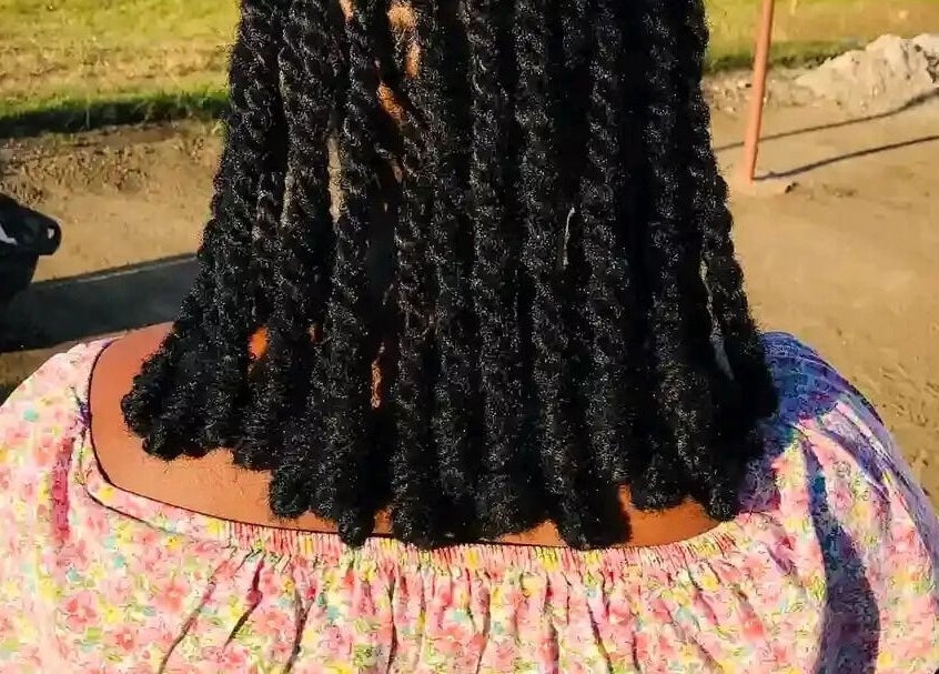 A stunning braided hairstyle at Nomsa's beauty salon in Vanderbijlpark, Gauteng, ZA.
