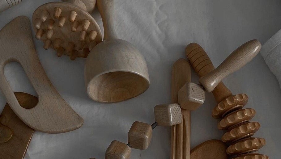 Elegant wooden massage tools at Maison Iaso, London, GB, offering calming relaxation experiences.