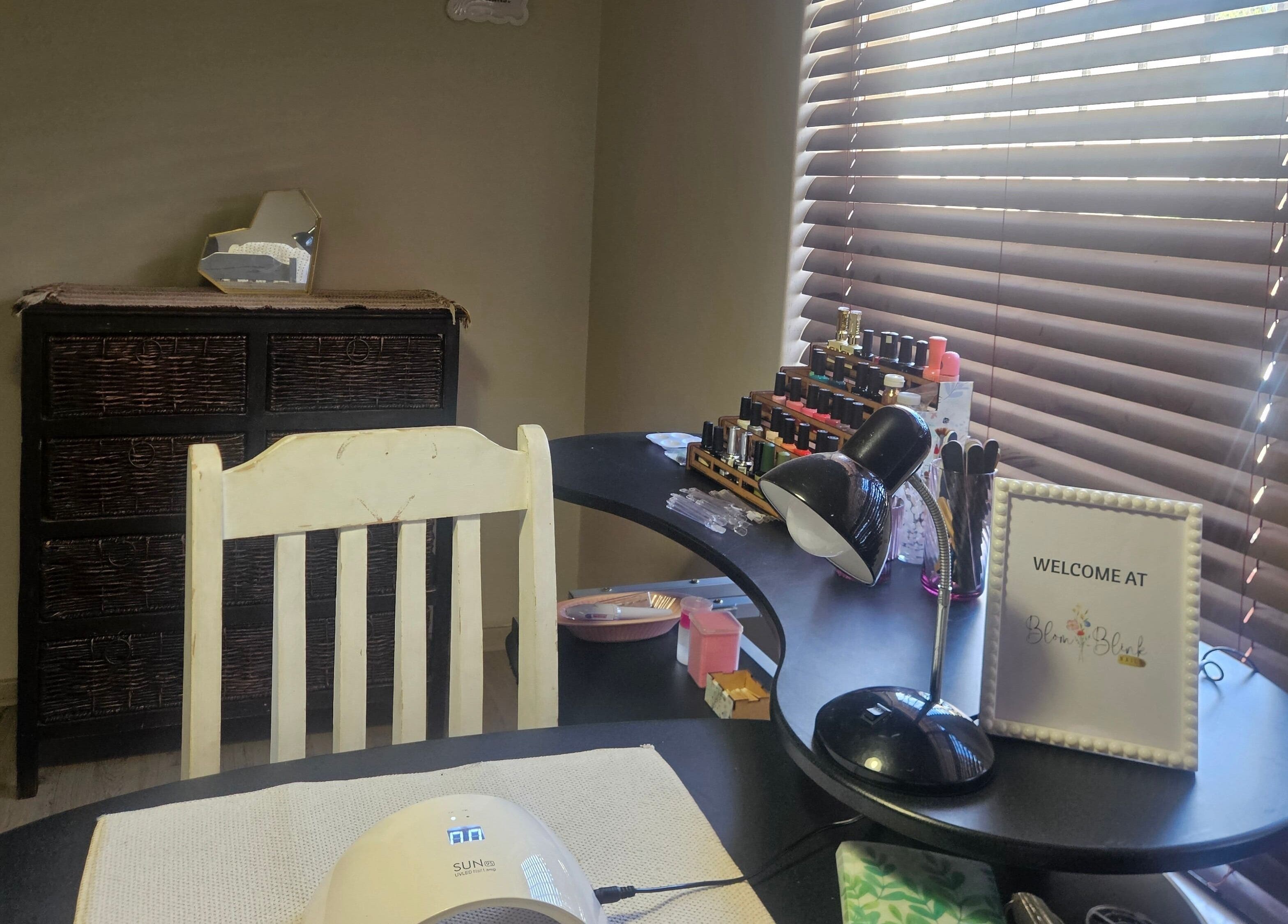 Cozy nail station at Blom & Blink Nails, Bloemfontein, Free State, ZA with tools and decor.