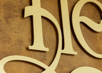 Close-up of gold signage at Hebra Beauty Studio, Guaynabo, Guaynabo, PR.