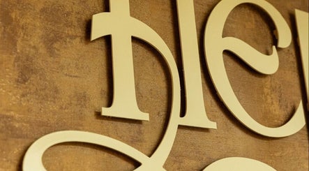 Close-up of gold signage at Hebra Beauty Studio, Guaynabo, Guaynabo, PR.