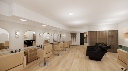 Elegant interior of Hebra Beauty Studio, Guaynabo, PR with stylish salon chairs and mirrors.