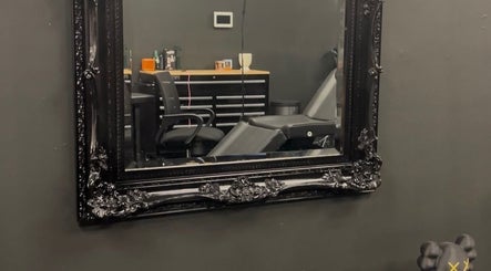 Elegant interior of Perfect Match Ink with ornate mirror in Margate, Florida, US.