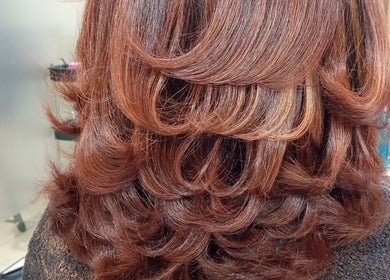 Lustrous layered hairstyle at Belindah the Hairdresser, Cape Town, Western Cape, ZA. Perfect for all occasions.