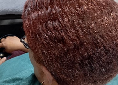 Closeup of freshly dyed red hair at Belindah the Hairdresser in Cape Town, Western Cape, ZA.